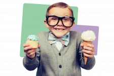 Boy with ice cream cupcake