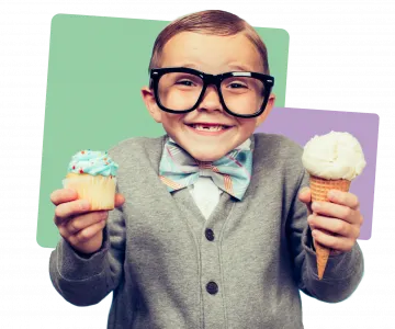 Boy with ice cream cupcake