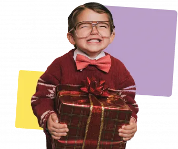 Kid smiling with present